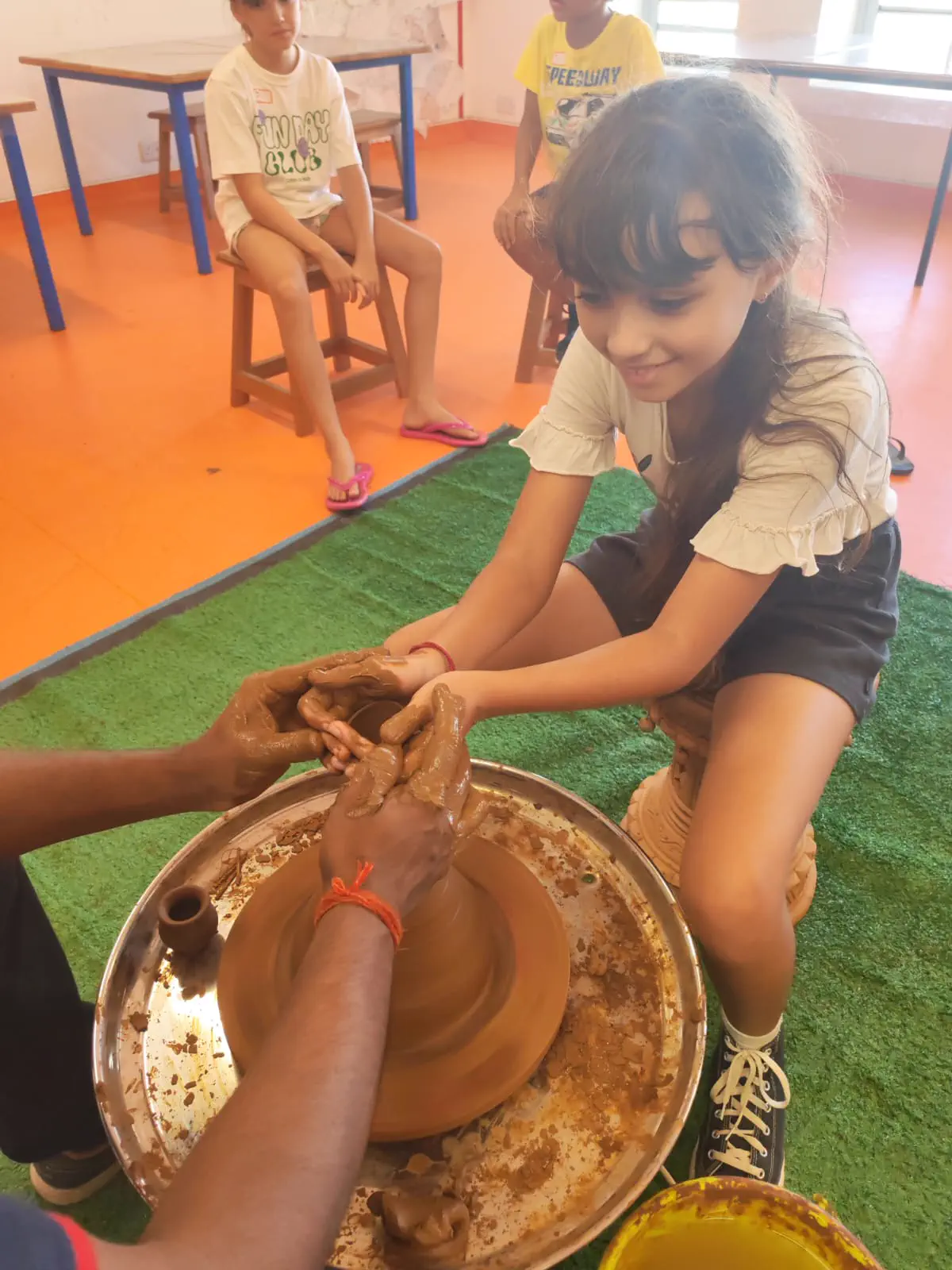 Students discovering pottery with Ram Pottery Mauritius